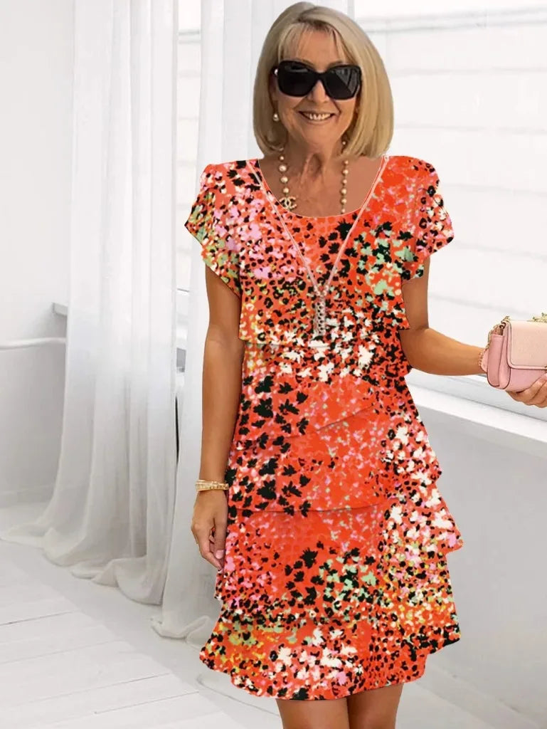 Virginia – Vestido elegante y vaporoso con volantes